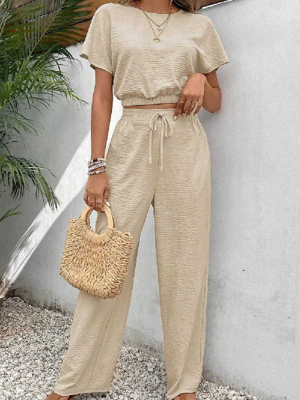 Beige Textured Crop Top and Wide Leg Pants Set with Elastic Hem Fashionable Trendy Casual Beige Textured Crop Top and Wide Leg Pants Set with Elastic Hem Fashionable Trendy Casual