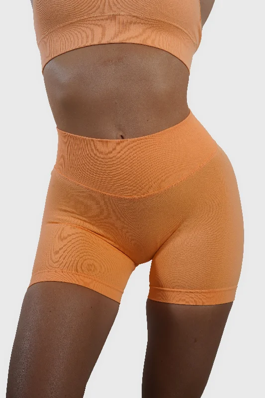 RECOIL SCRUNCH SHORTS - ORANGE SHERBET